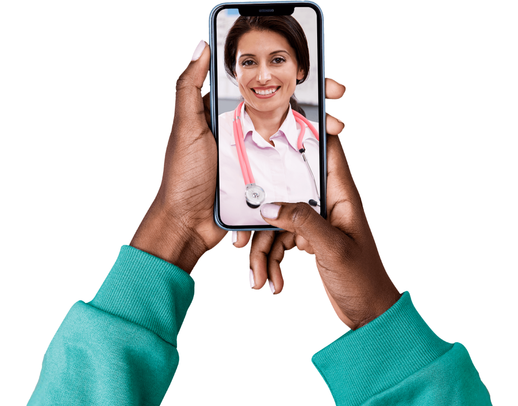 A person wearing a teal sweater holds a smartphone showing an image of a smiling woman with short dark hair, wearing a white coat and pink stethoscope, suggesting a virtual healthcare consultation.